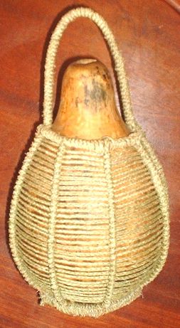Calabash covered in hand woven grass